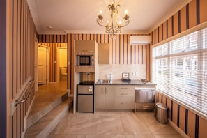Premium Two Bedroom Suite (In Adjacent Building) | Private kitchen | Fridge, coffee/tea maker, electric kettle