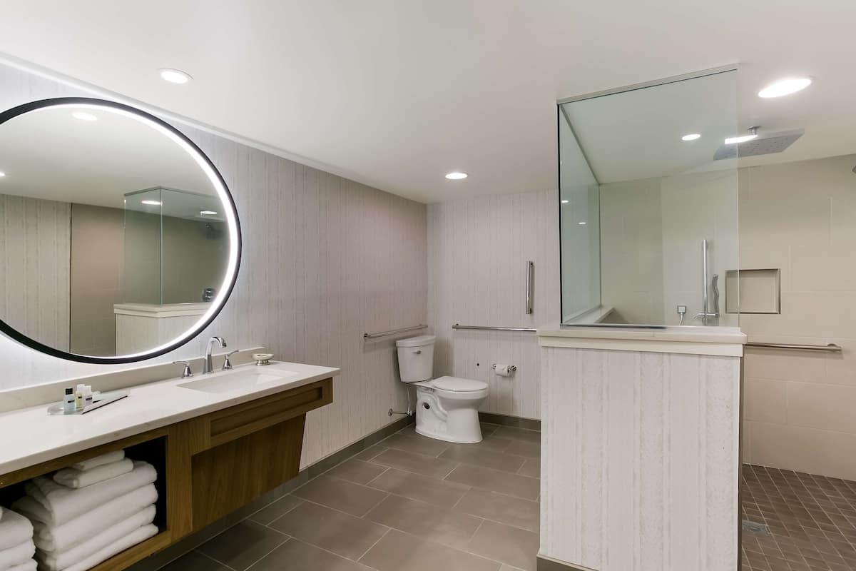 suite, multiple beds, accessible, refrigerator & microwave (dining table) | bathroom | free toiletries, hair dryer, towels