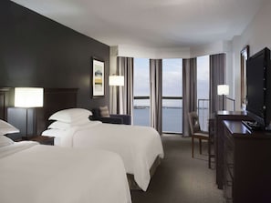 Premium bedding, down comforters, pillowtop beds, in-room safe