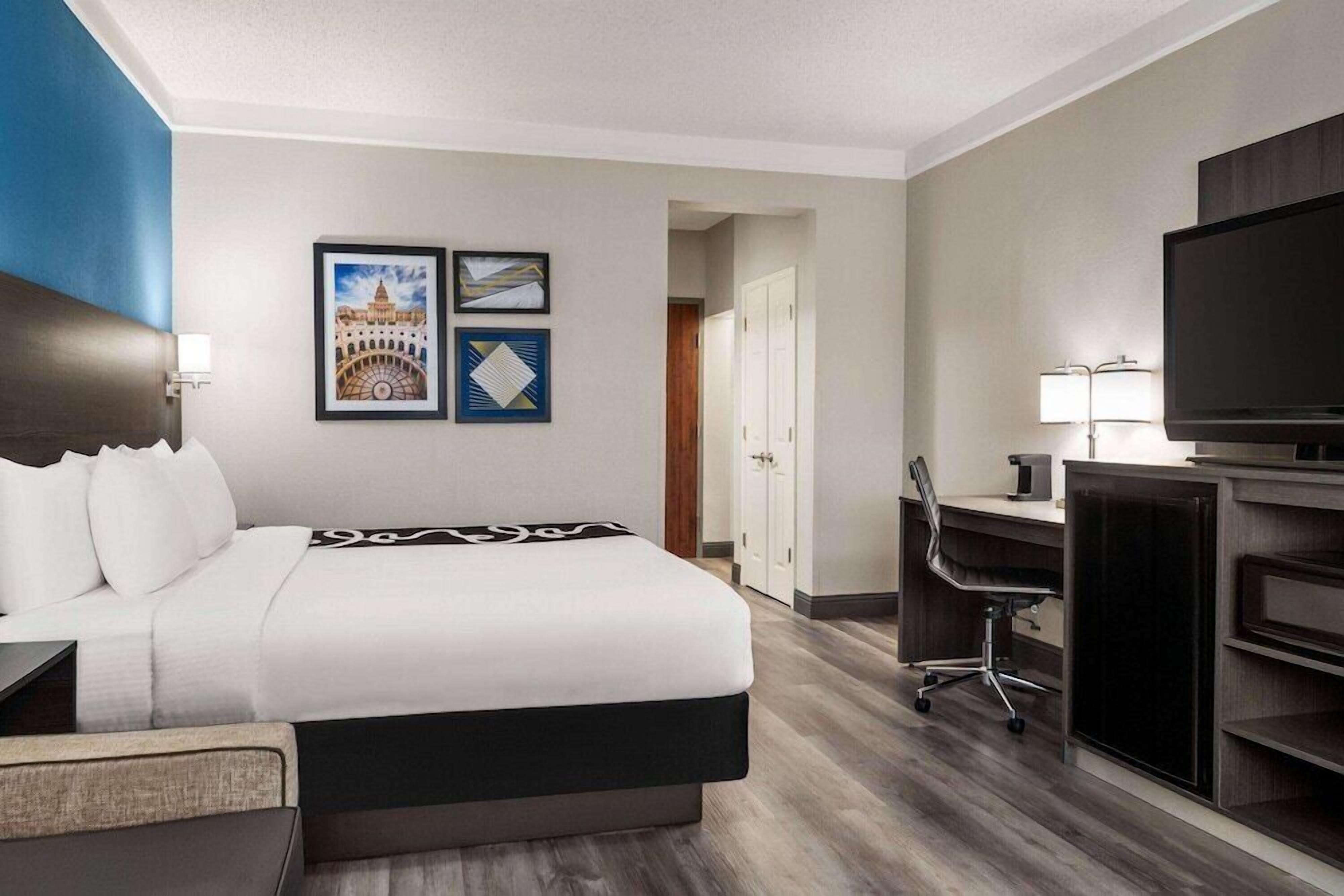 Pillow-top beds, desk, laptop workspace, blackout curtains