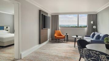 Junior Suite, 1 King Bed | Premium bedding, down comforters, pillowtop beds, in-room safe