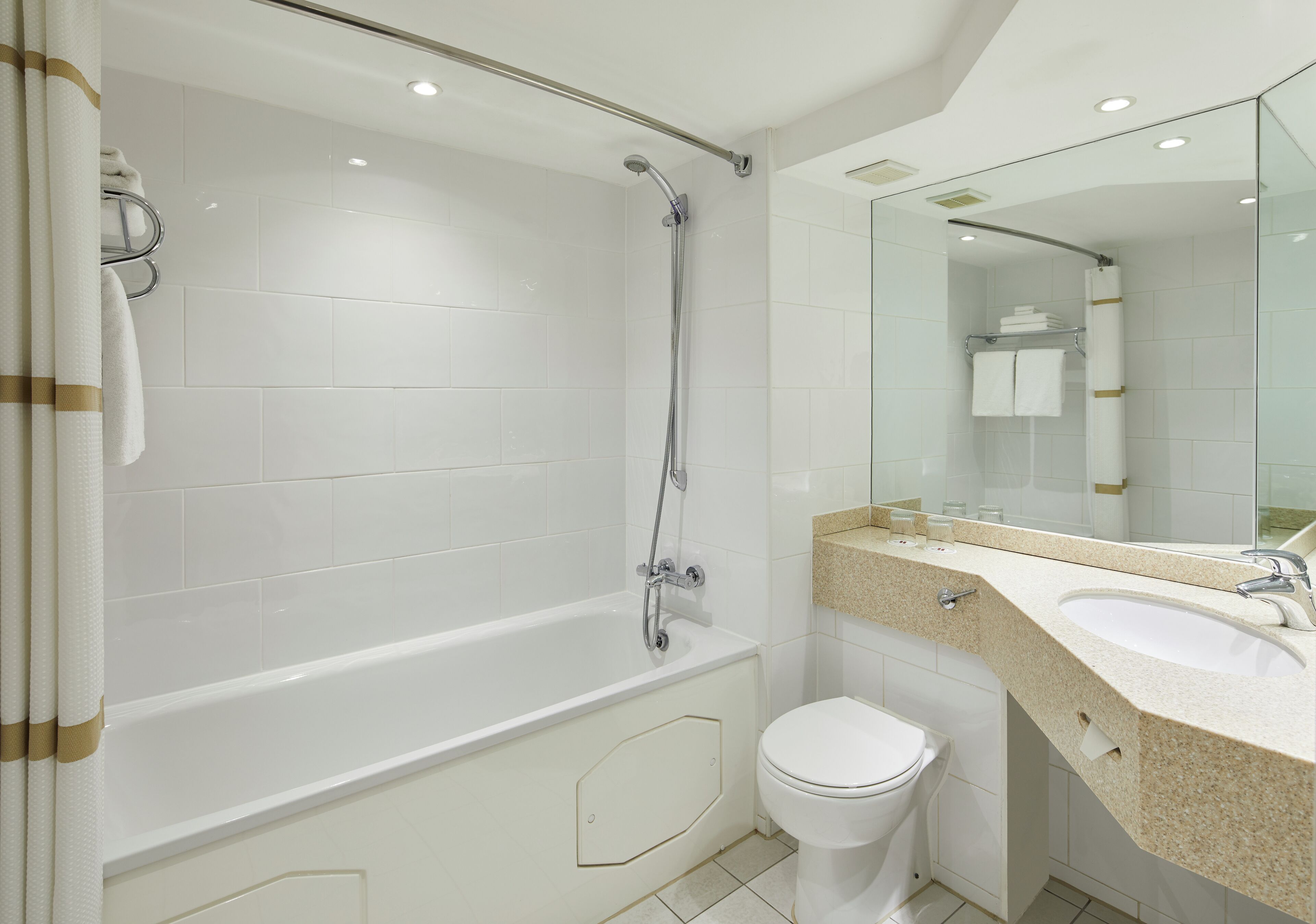 combined shower/bathtub, deep-soaking bathtub, designer toiletries