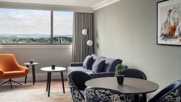 Junior Suite, 1 King Bed | Premium bedding, down comforters, pillowtop beds, in-room safe