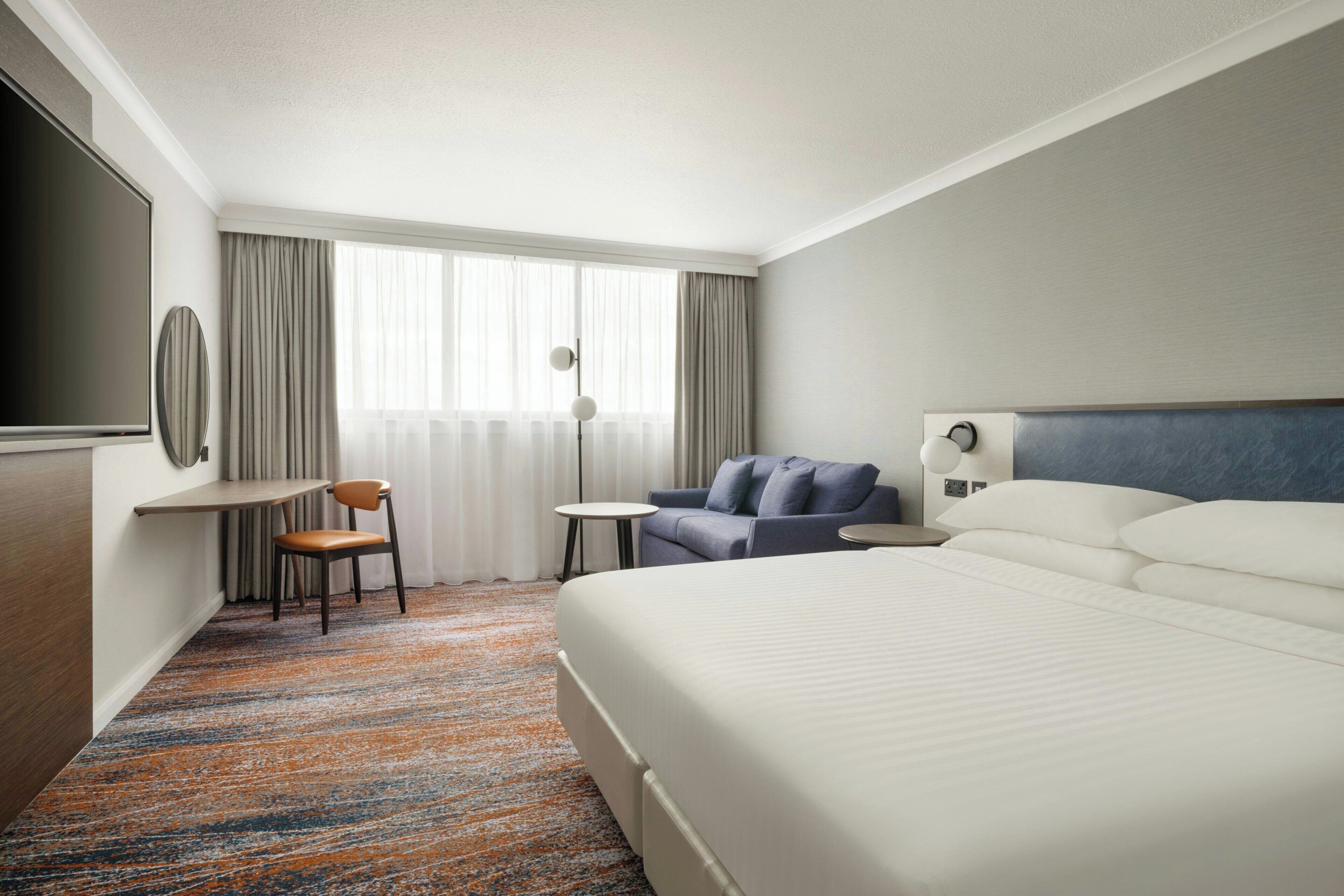 Premium bedding, down comforters, pillowtop beds, in-room safe