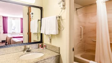 Bathtub, hair dryer, towels