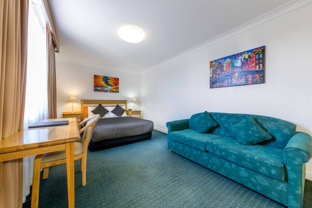 Standard Queen Room. No ground floor rooms available for this room type | Premium bedding, desk, iron/ironing board, cribs (surcharge)