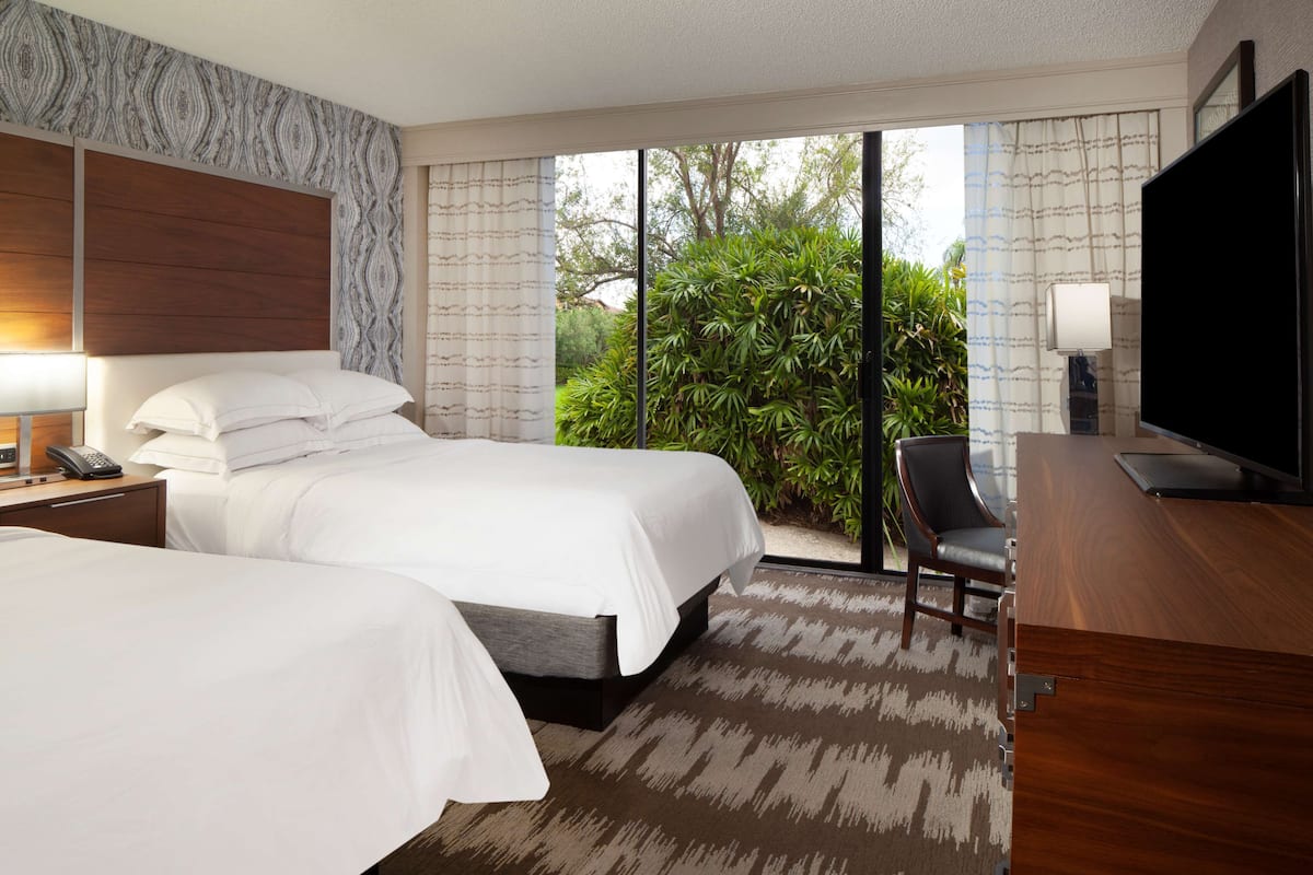 family suite, 2 bedrooms (1 king & 2 double beds) | premium bedding, down duvets, pillow-top beds, desk