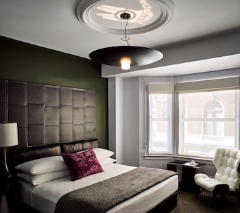 In-room safe, desk, blackout drapes, iron/ironing board at Hotel Zeppelin San Francisco