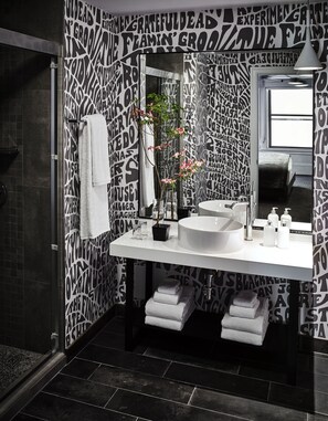 Combined shower/bathtub, free toiletries, hair dryer, bathrobes