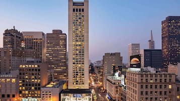 Stunning city views from a high-rise building with windows and a flat roof.