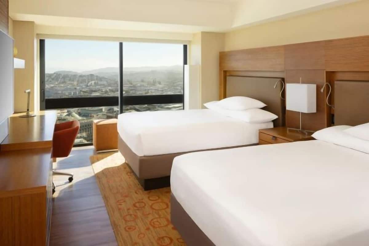 Premium bedding, pillow-top beds, in-room safe, desk