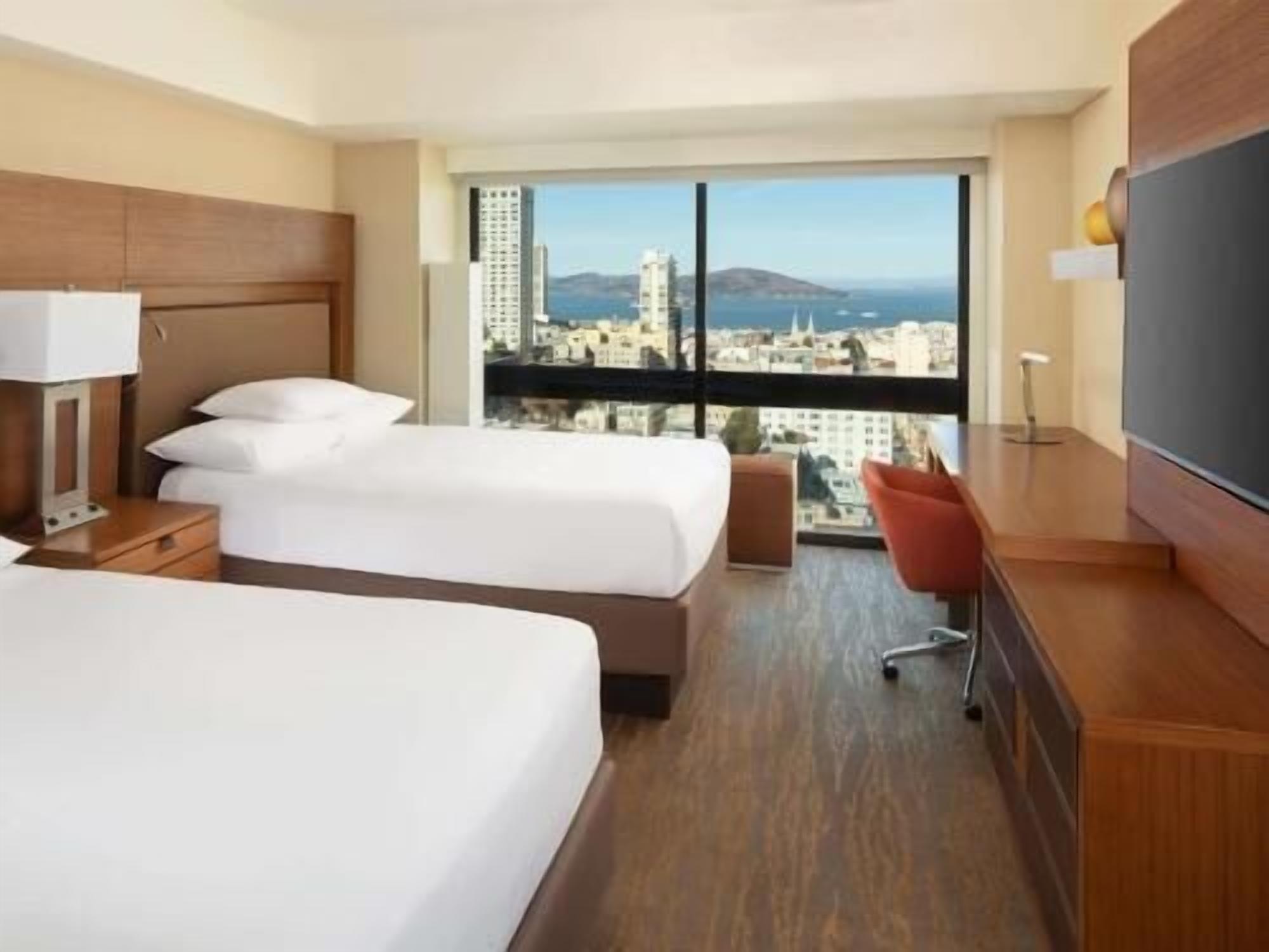 Premium bedding, pillow-top beds, in-room safe, desk