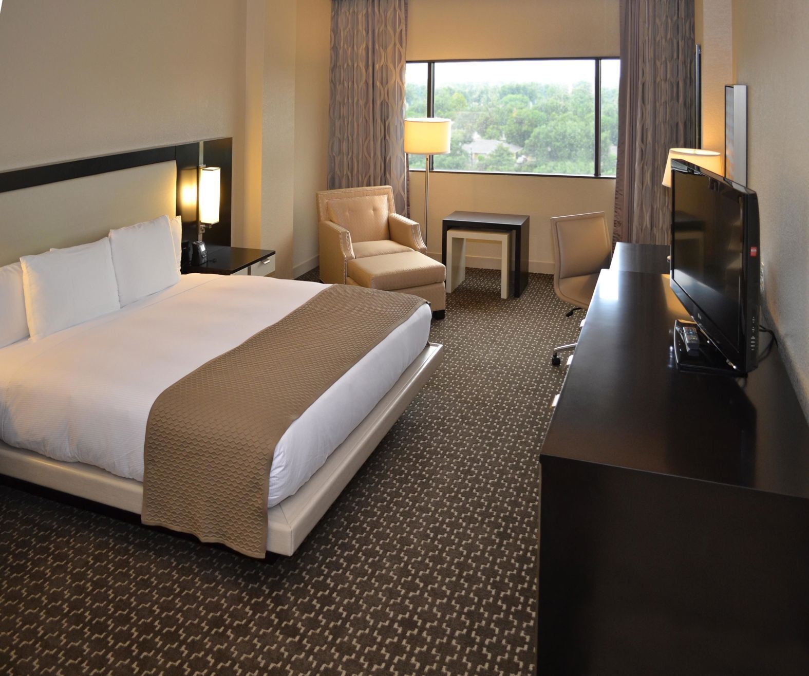 Premium bedding, down duvets, in-room safe, desk