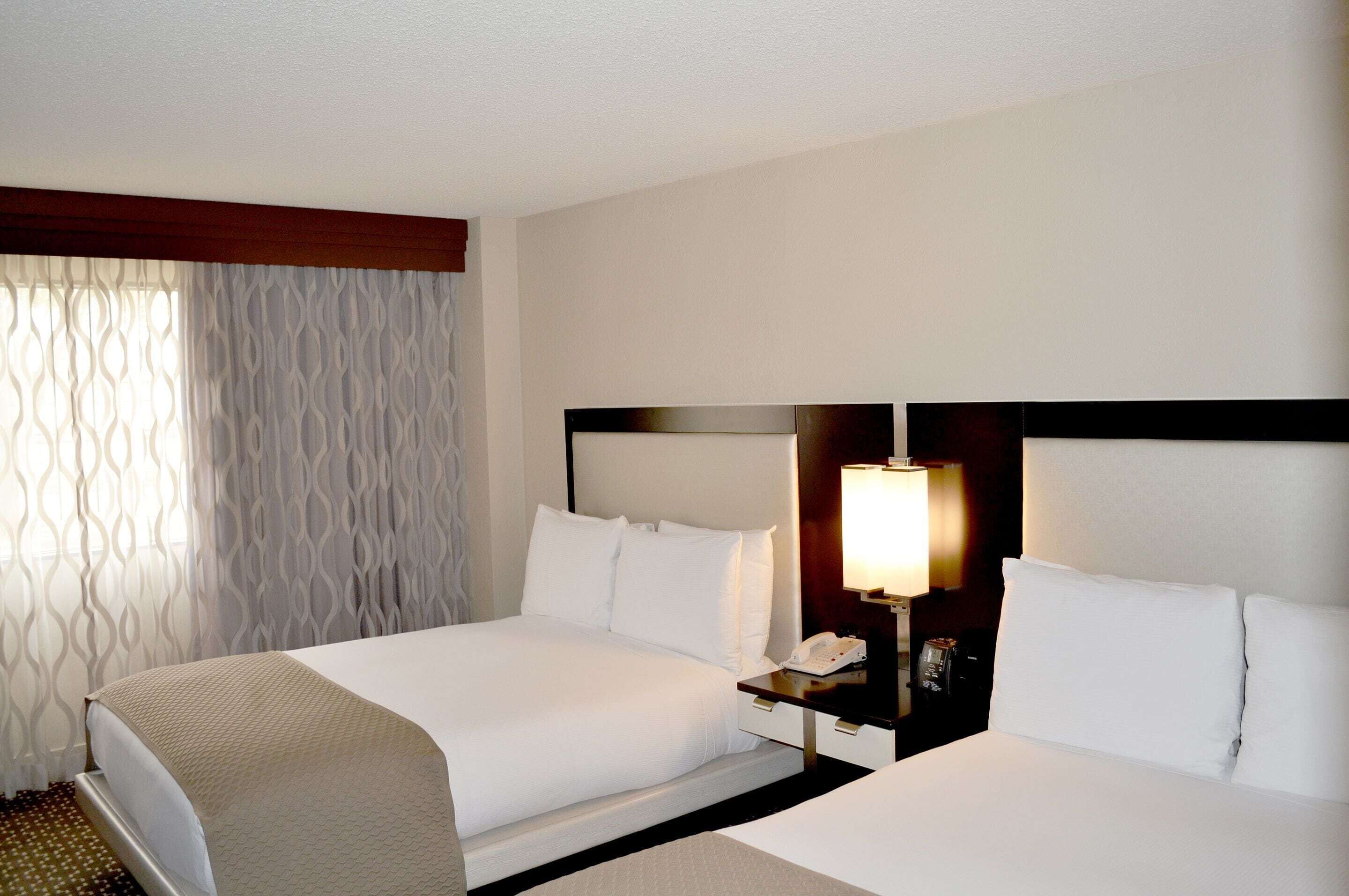 Premium bedding, down duvets, in-room safe, desk