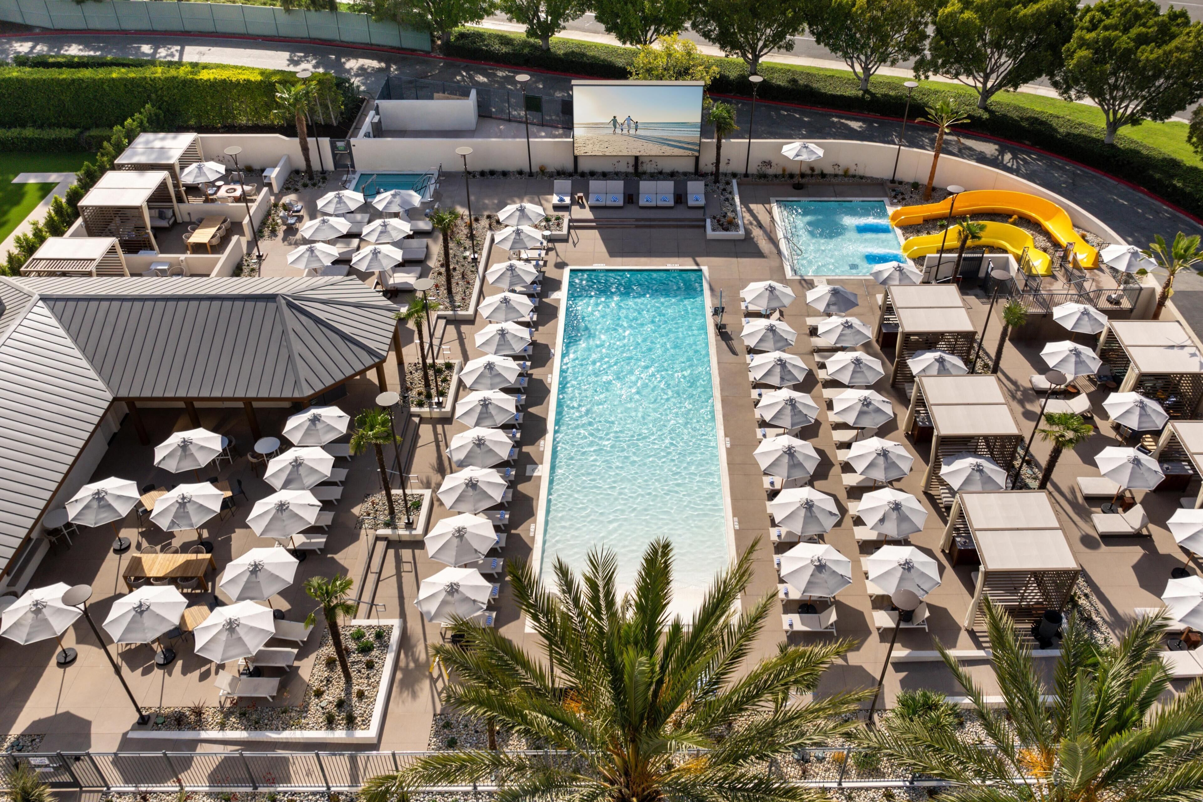 Outdoor pool, open 7:00 AM to 10:00 PM, cabanas (surcharge)