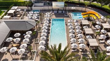 Outdoor pool, open 7:00 AM to 10:00 PM, cabanas (surcharge)