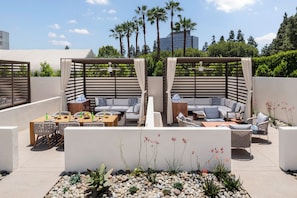 Outdoor pool, open 7:00 AM to 10:00 PM, cabanas (surcharge)