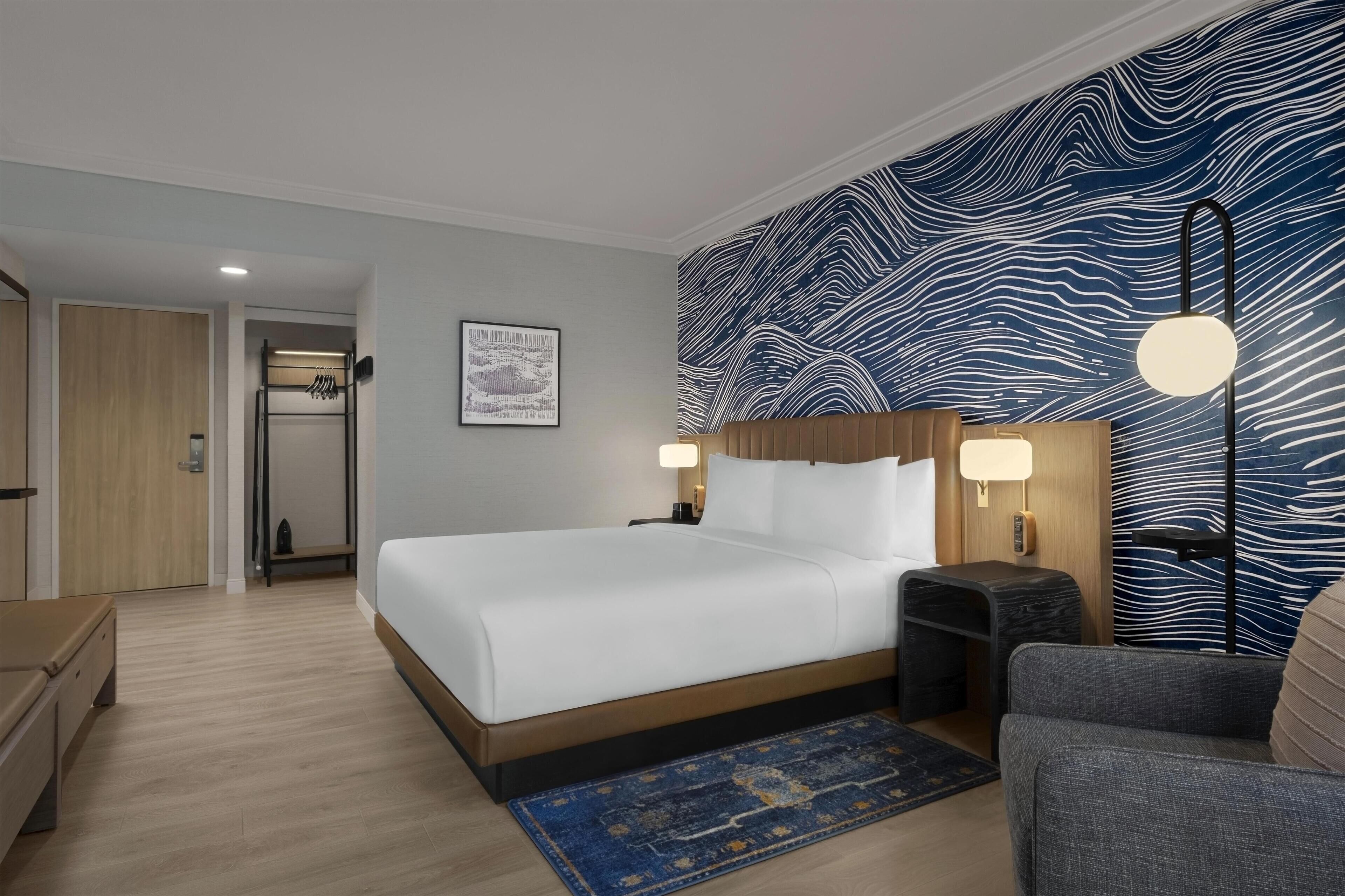 Premium bedding, down duvets, memory-foam beds, in-room safe