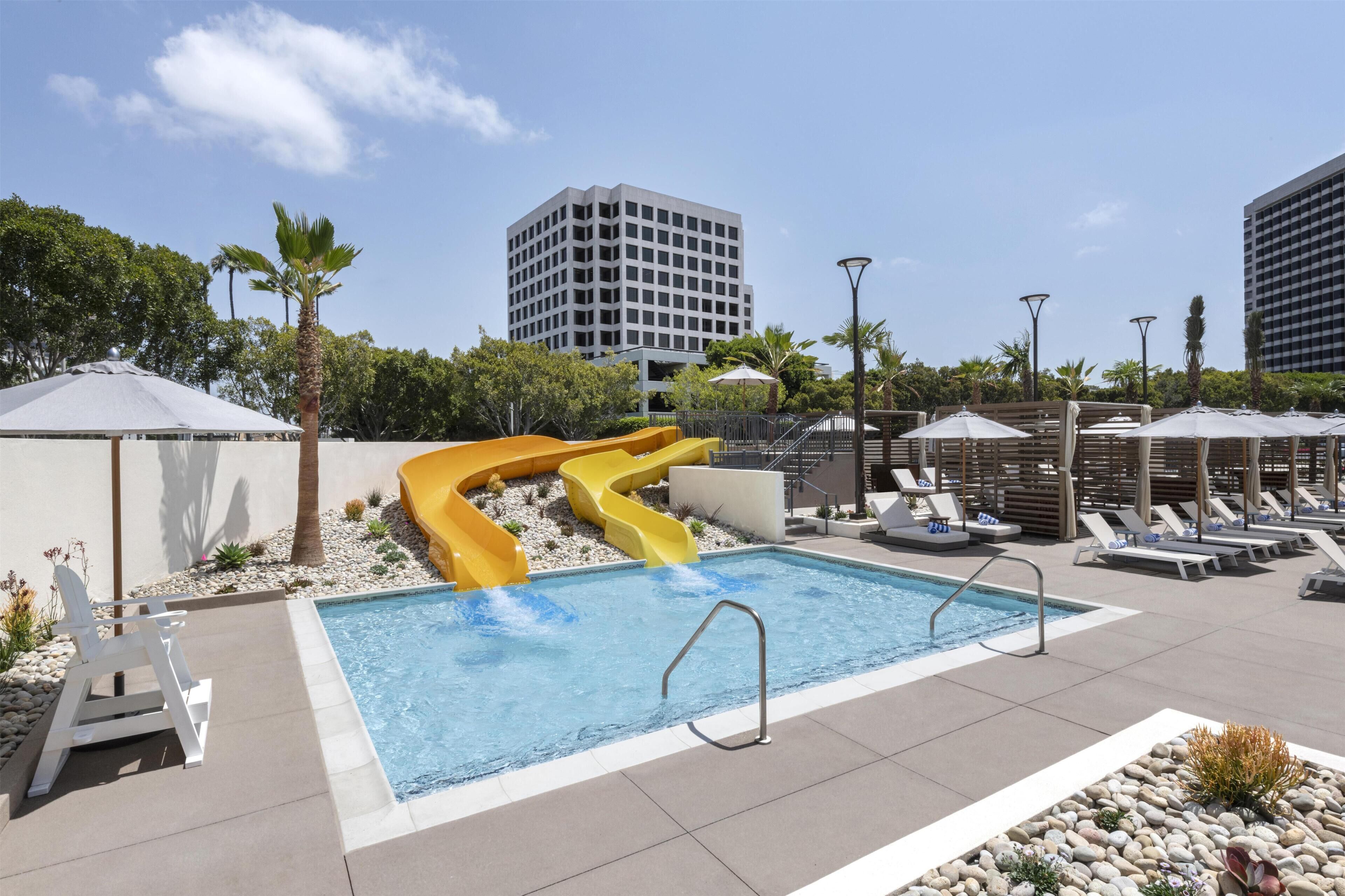 Outdoor pool, open 7:00 AM to 10:00 PM, cabanas (surcharge)