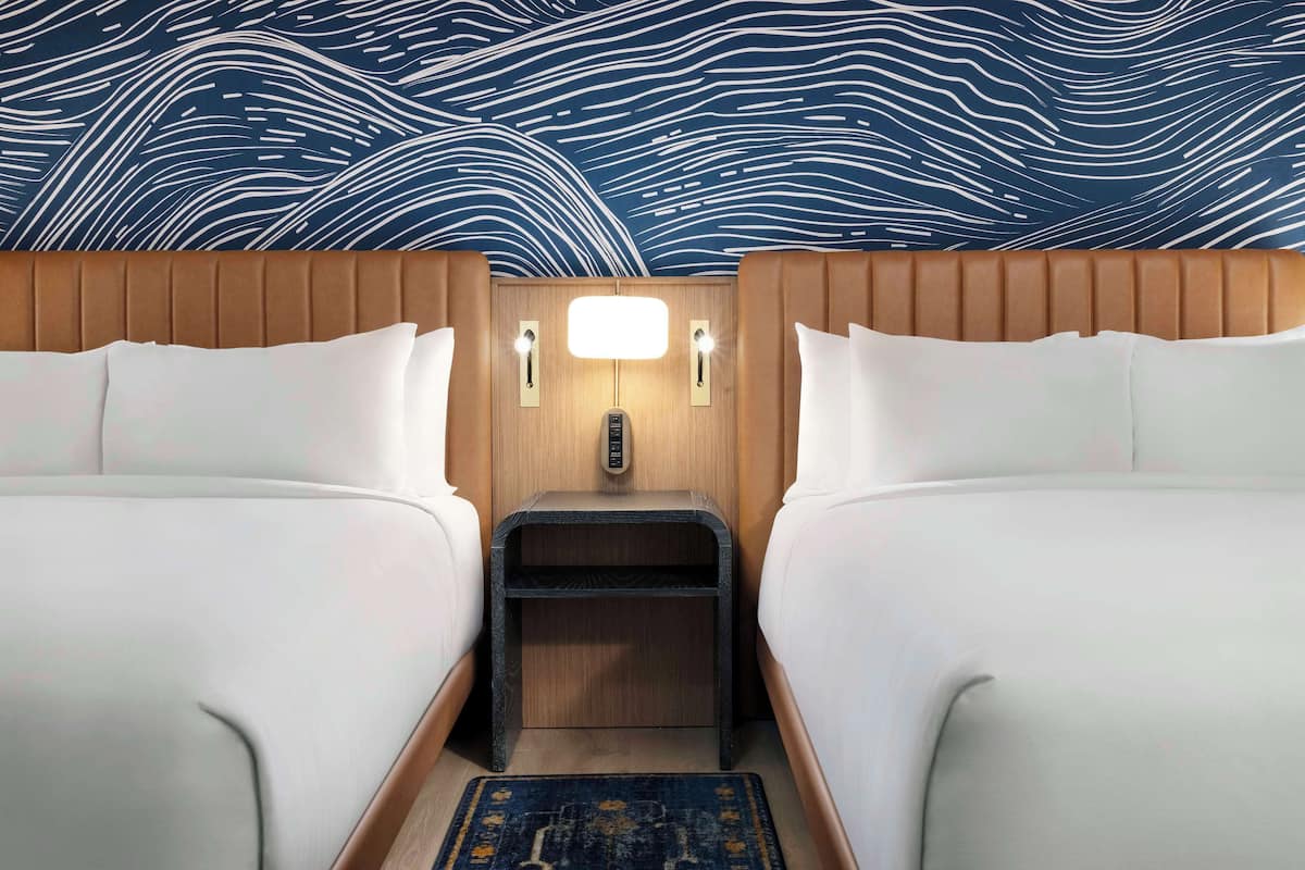 Premium bedding, down duvets, memory-foam beds, in-room safe
