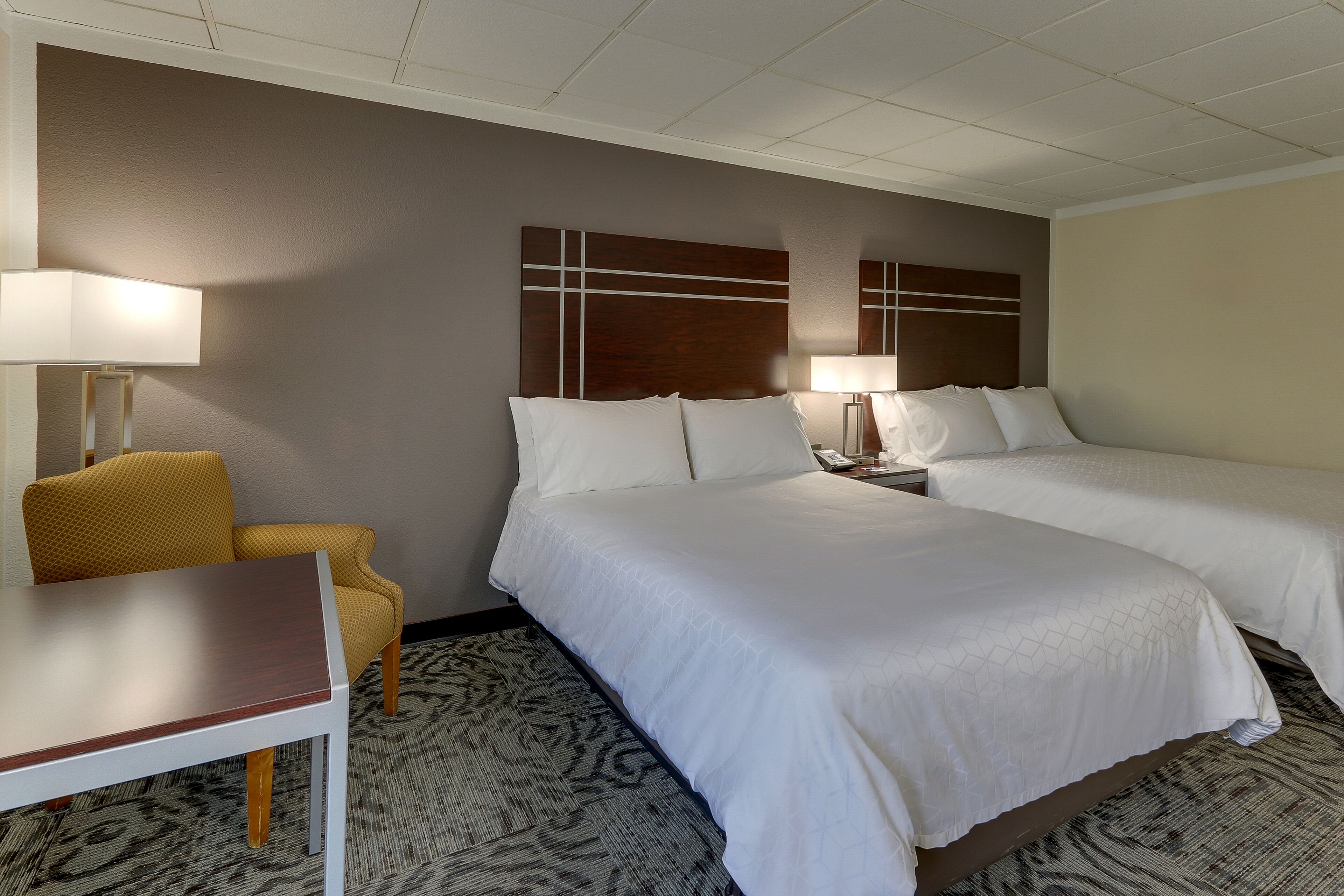 premium bedding, desk, blackout curtains, iron/ironing board