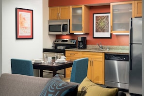 Full-sized fridge, microwave, stovetop, dishwasher