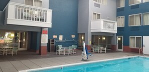 Indoor pool, open 8:00 AM to 10:00 PM, pool loungers