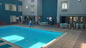 Indoor pool, open 8:00 AM to 10:00 PM, pool loungers
