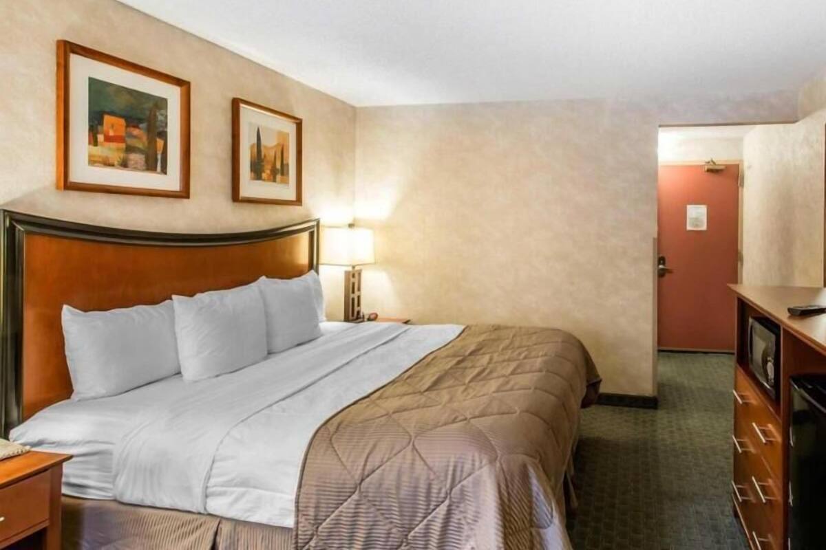 Premium bedding, desk, blackout curtains, iron/ironing board