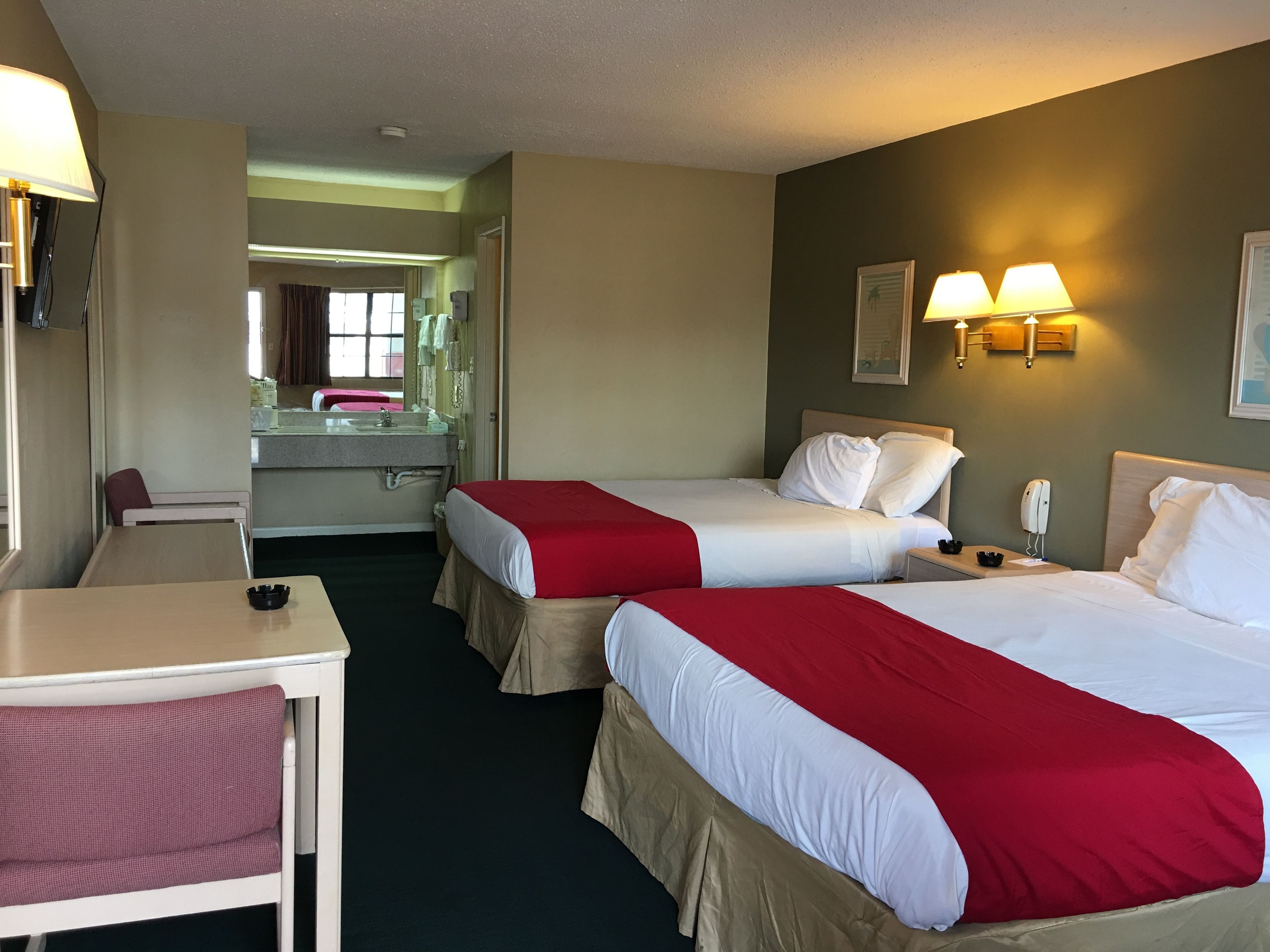 Room, 2 Queen Beds, Smoking | Iron/ironing board, free WiFi, bed sheets