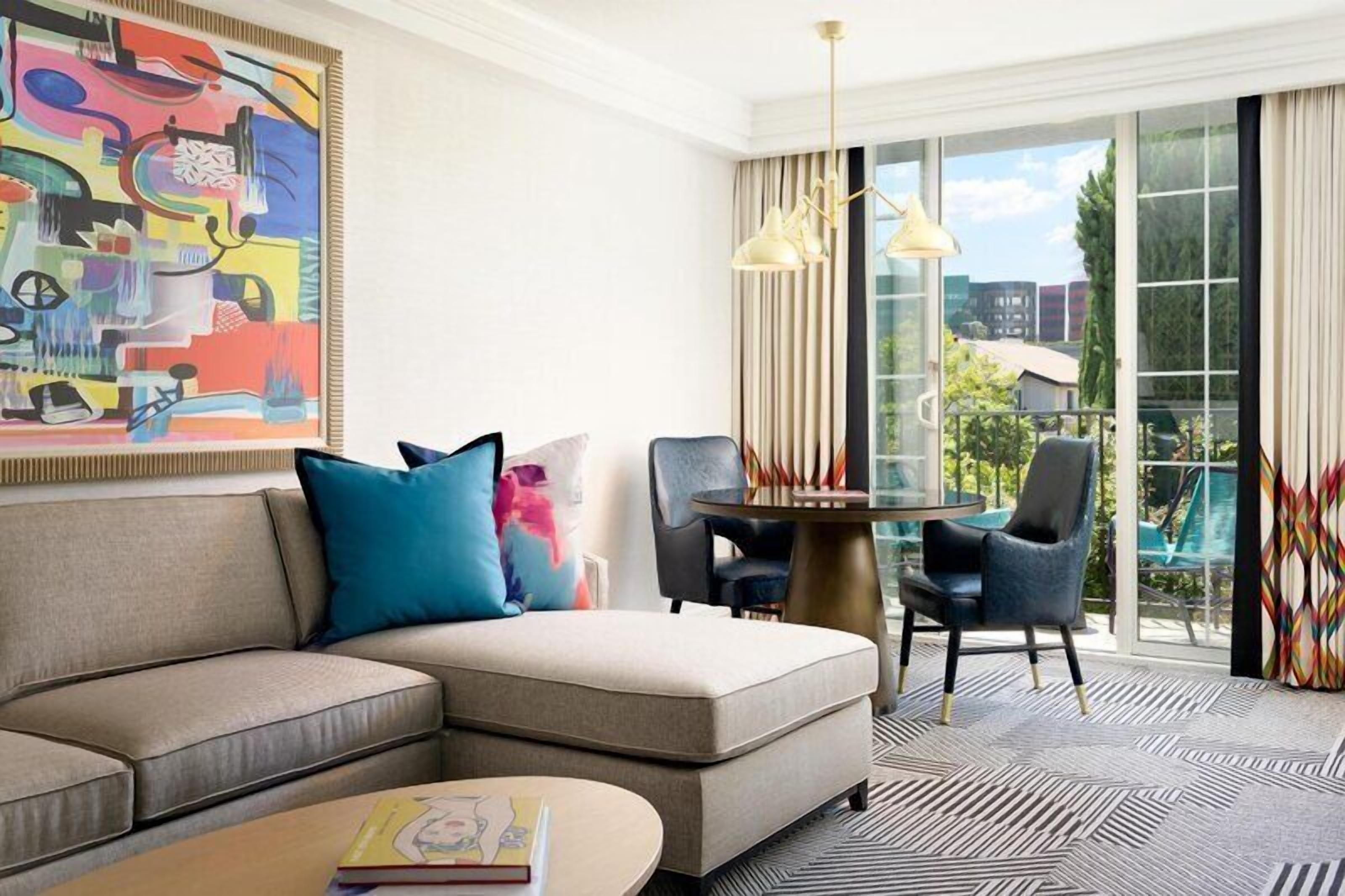 Signature King Suite, Top Floor with Balcony | Living area | Smart TV, fireplace, streaming services