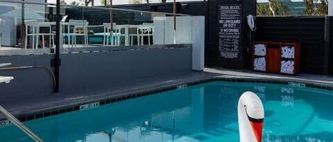 Outdoor pool, open 7 AM to 11 PM, pool cabanas (surcharge)