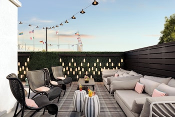 Outdoor pool, open 7 AM to 11 PM, cabanas (surcharge), pool umbrellas at  Le Parc at Melrose