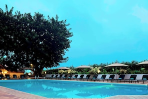 Outdoor pool, open 7:00 AM to 9:30 PM, pool umbrellas, sun loungers