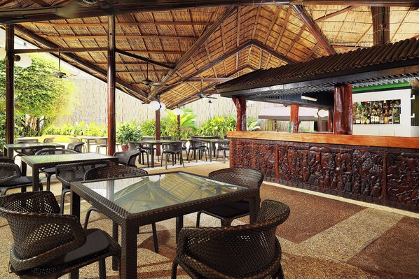 Outdoor pool, open 7:00 AM to 9:30 PM, pool umbrellas, sun loungers