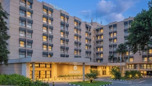 A Sheraton hotel with a modern facade, multiple balconies, and a well-lit entrance. - Sheraton Lagos Hotel (Lagos)