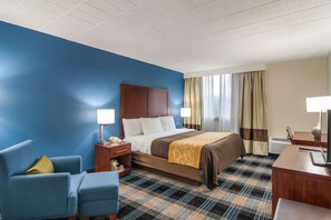Premium bedding, desk, laptop workspace, blackout curtains