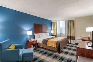 Premium bedding, desk, laptop workspace, blackout curtains