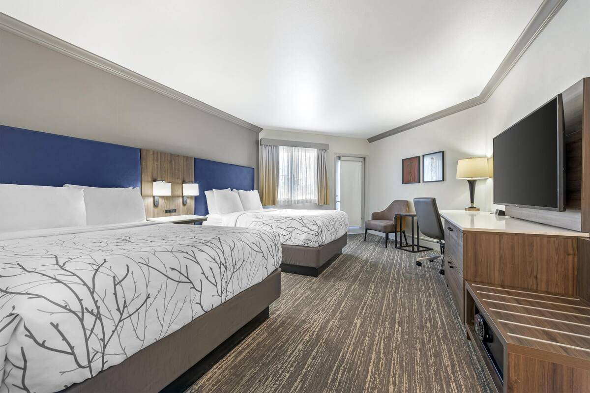 Standard Room, 2 Queen Beds, Patio, Poolside | Premium bedding, pillowtop beds, in-room safe, desk