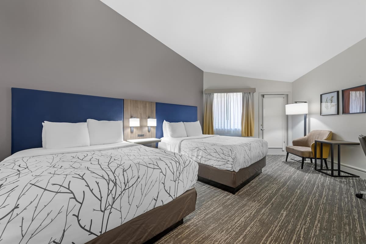 Standard Room, 2 Queen Beds, Balcony, Pool View | Premium bedding, pillowtop beds, in-room safe, desk