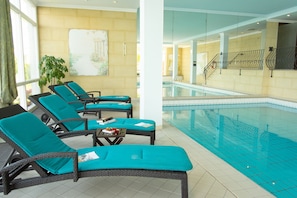 Indoor pool, open 7:00 AM to 10:00 PM, pool umbrellas, sun loungers
