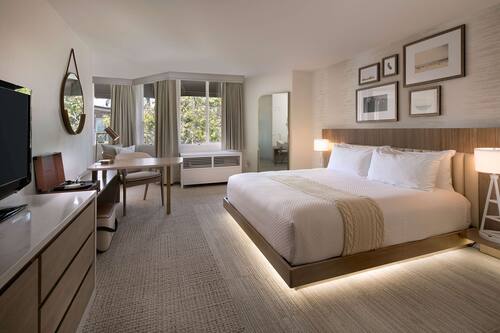 Premium bedding, down comforters, in-room safe, desk