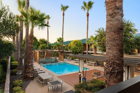 Indoor pool, outdoor pool, open 8:00 AM to 10:00 PM, pool loungers