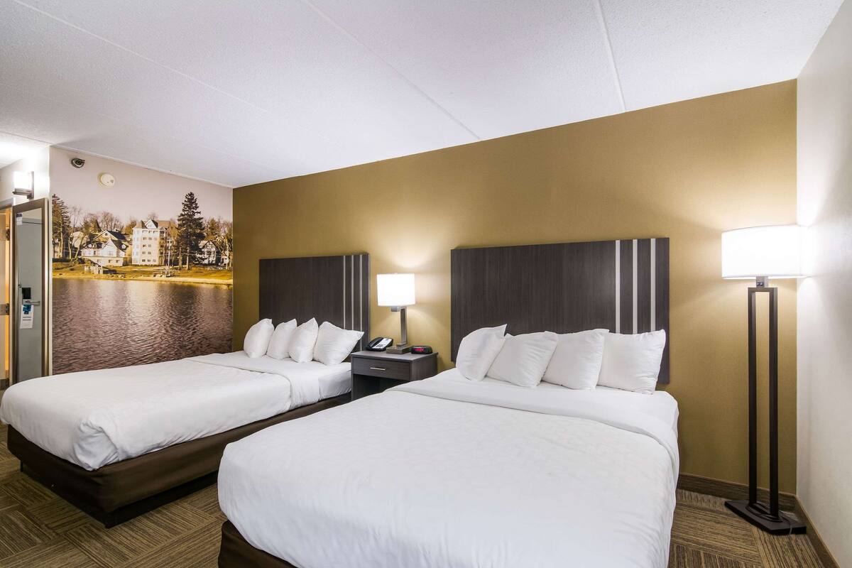 standard room, 2 queen beds, non smoking | in-room safe, desk, laptop workspace, iron/ironing board