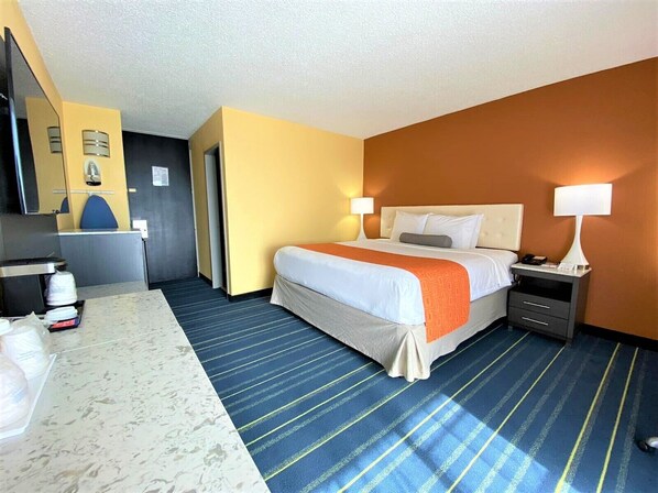 Coffres-forts dans les chambres, bureau, fer et planche à repasser