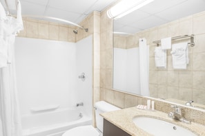 Combined shower/tub, designer toiletries, hair dryer, towels