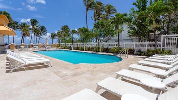 Outdoor pool, a heated pool, cabanas (surcharge), sun loungers