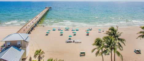 On the beach, beach cabanas, sun-loungers, beach umbrellas