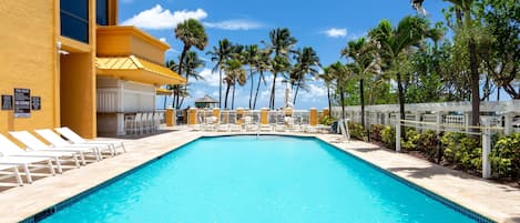 Outdoor pool, a heated pool, pool cabanas (surcharge), pool loungers