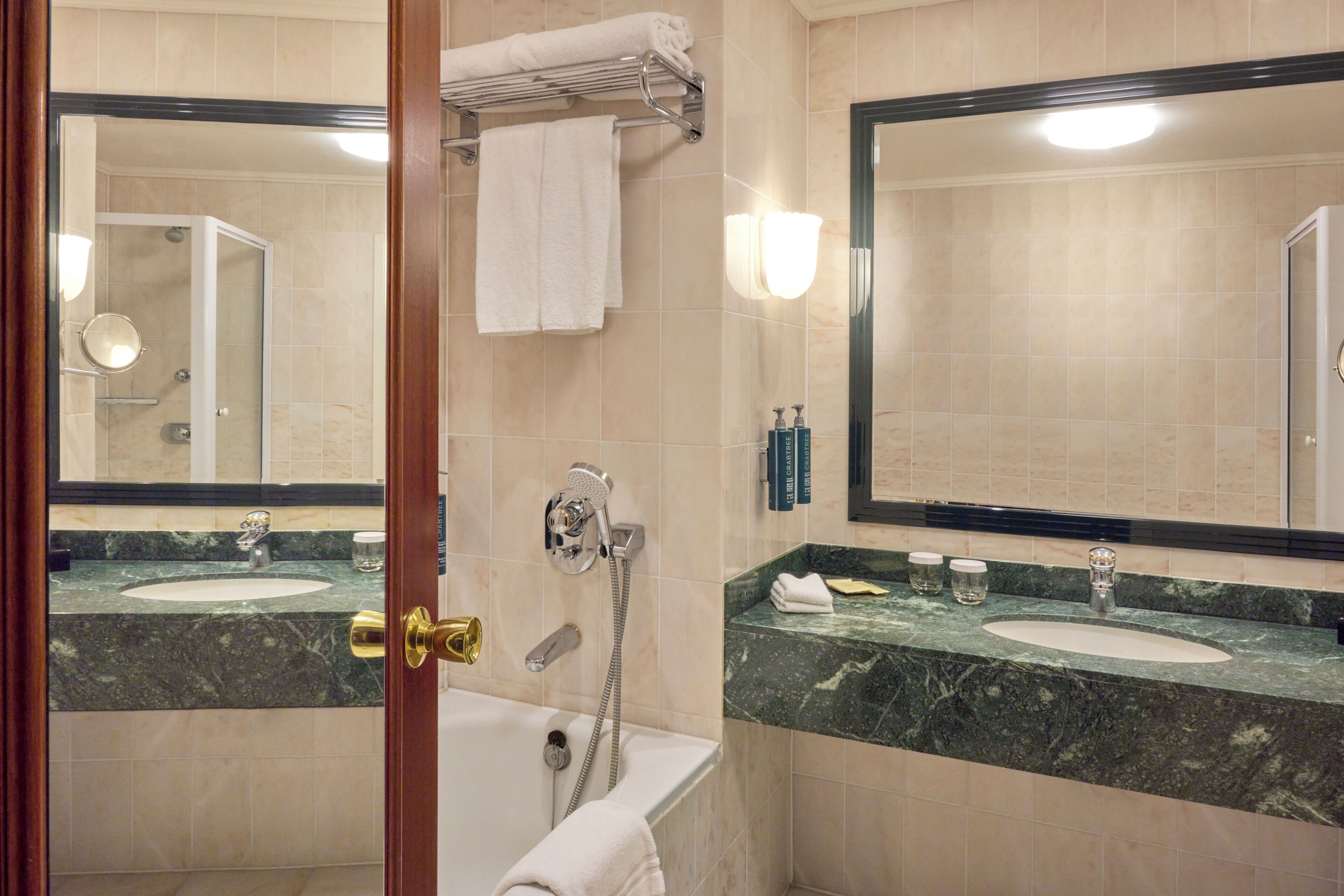 eco-friendly toiletries, hair dryer, towels